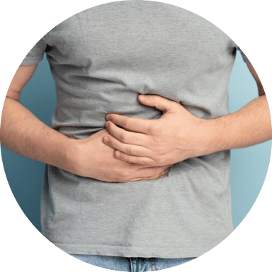 A man has a stomachache and needs a medical broker for endocrinology treatment in San Antonio, TX